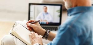 Psychiatrist with a patient through video conferencing