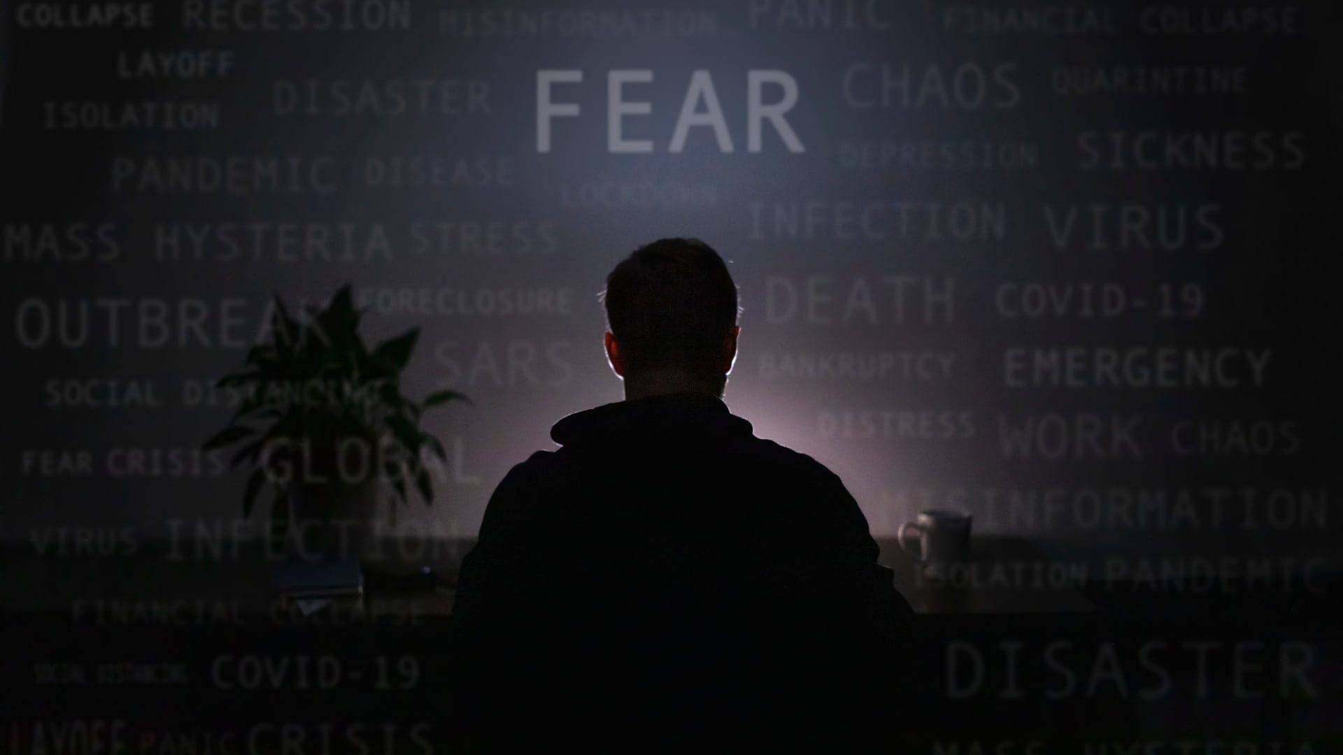 Man with word "FEAR" over him<br />