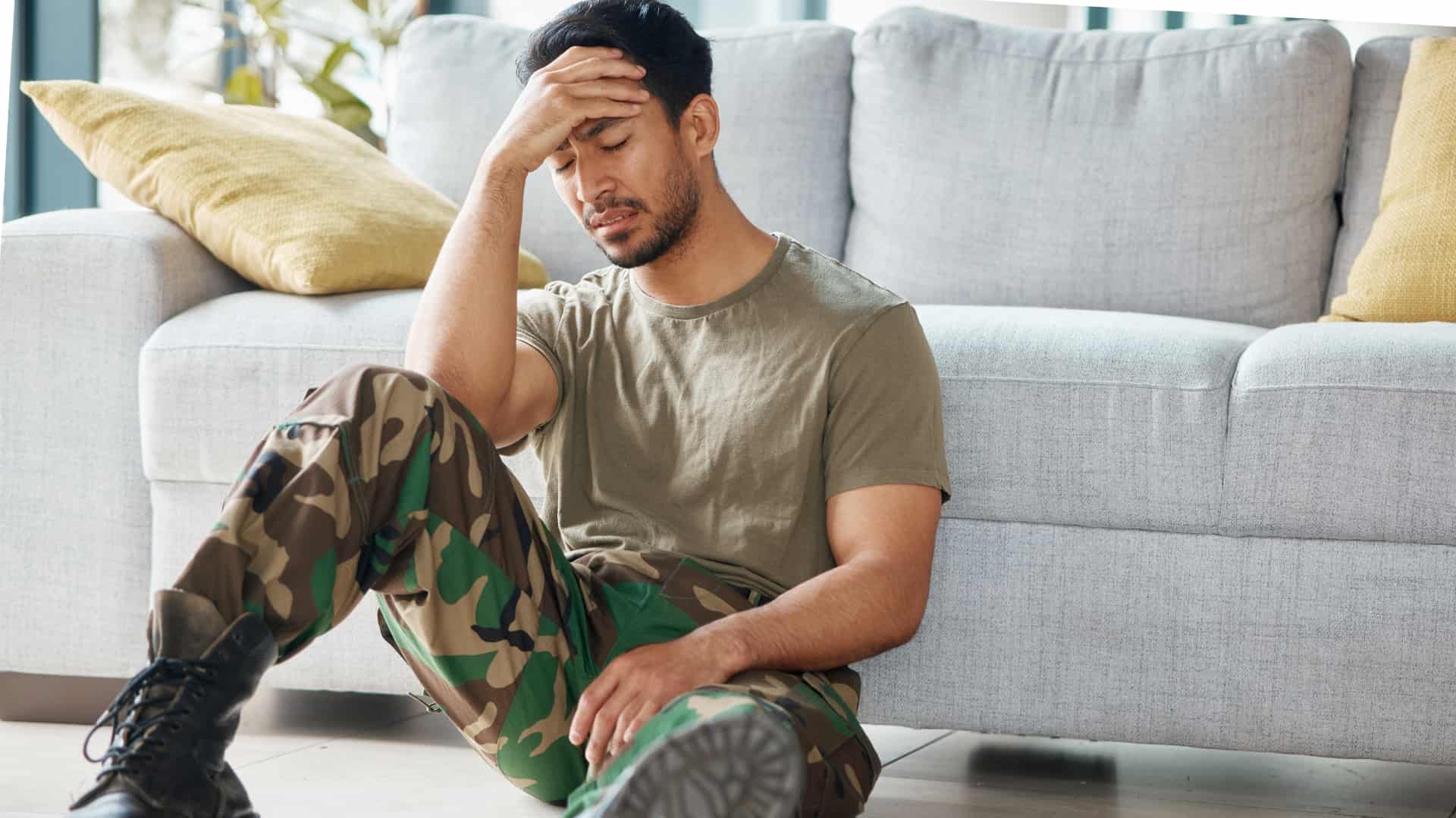 Veteran sitting on floor