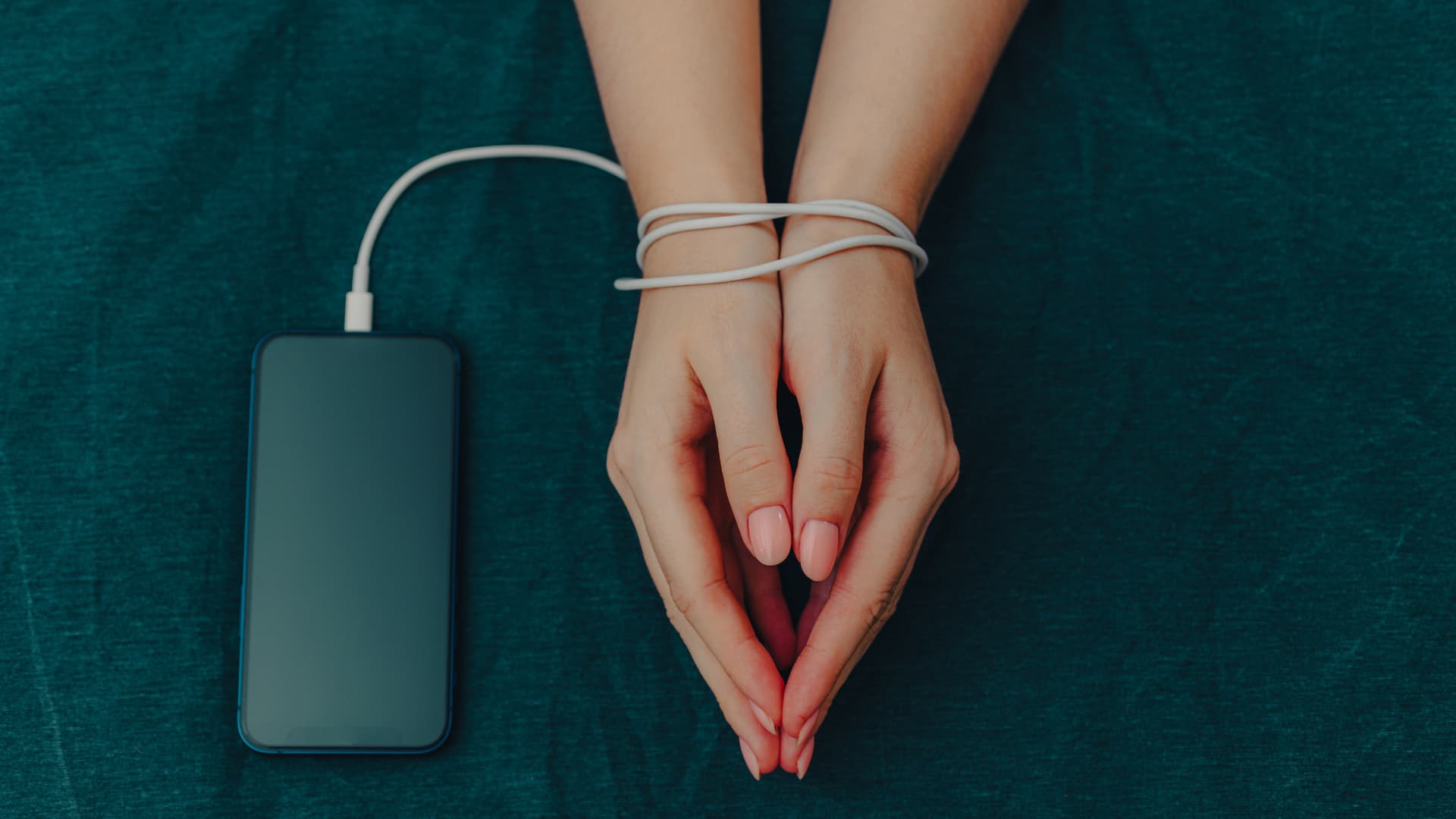 Hands tied by phone cord