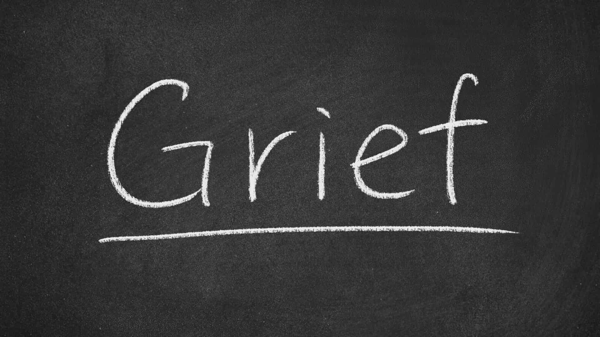 Blackboard with "Grief"