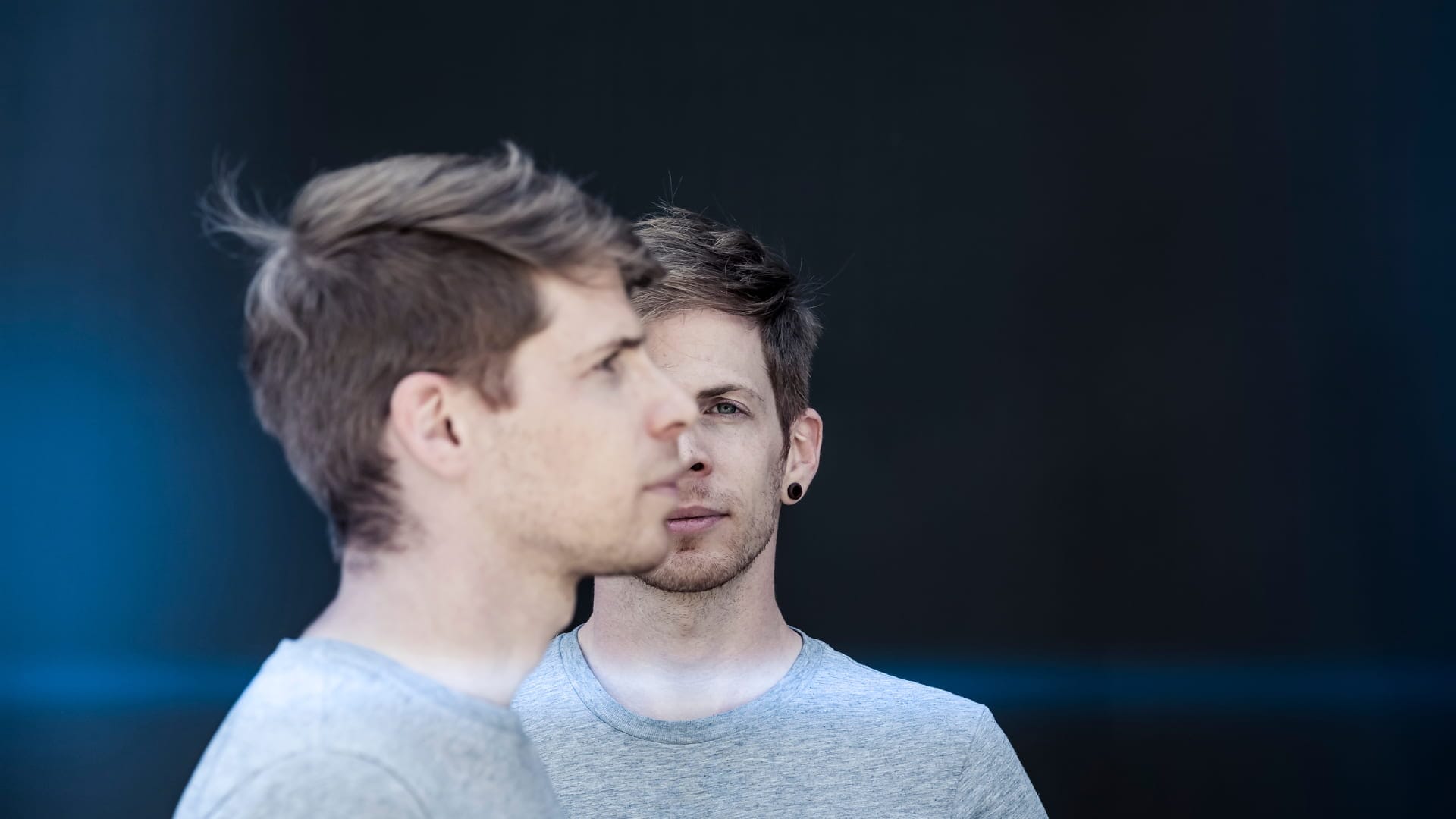 A double exposure of a man's face