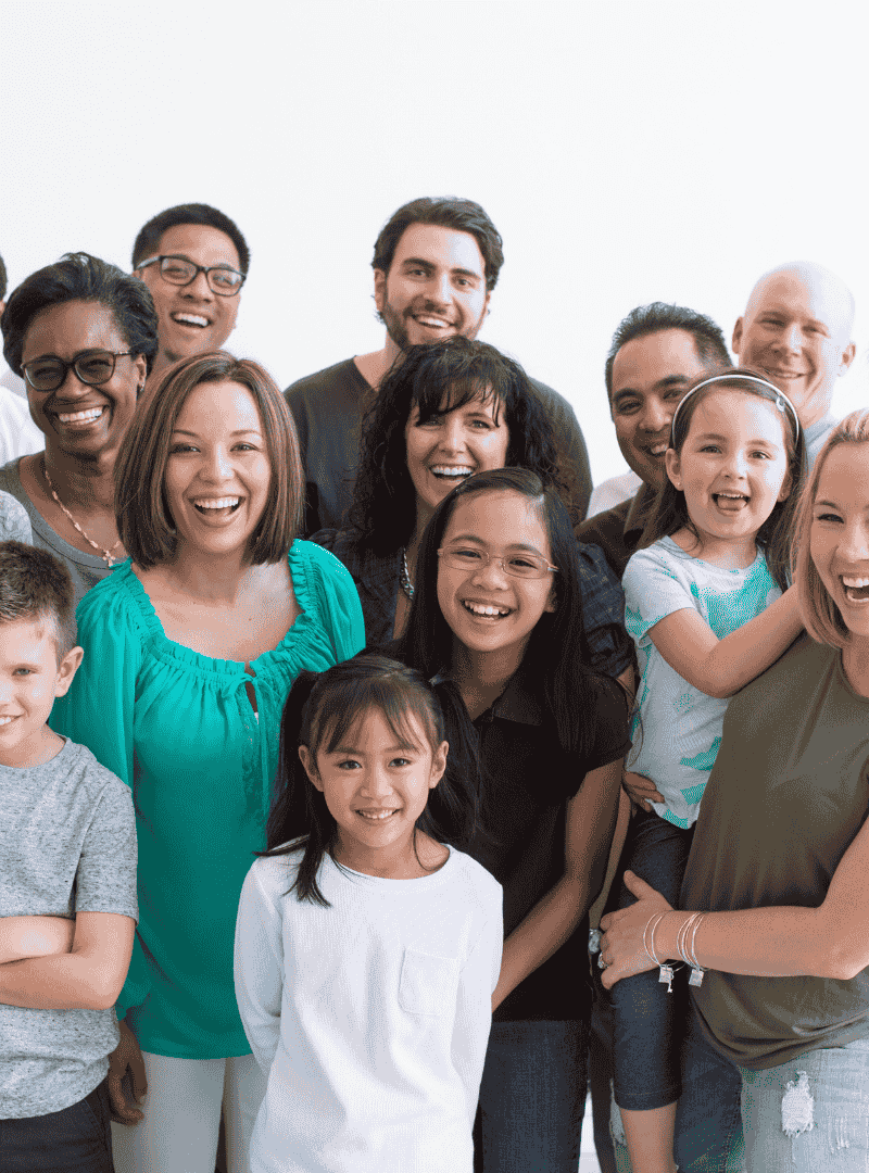 Image of satisfied patients of Dr. Nibras standing and smiling, showing gratitude and satisfaction.