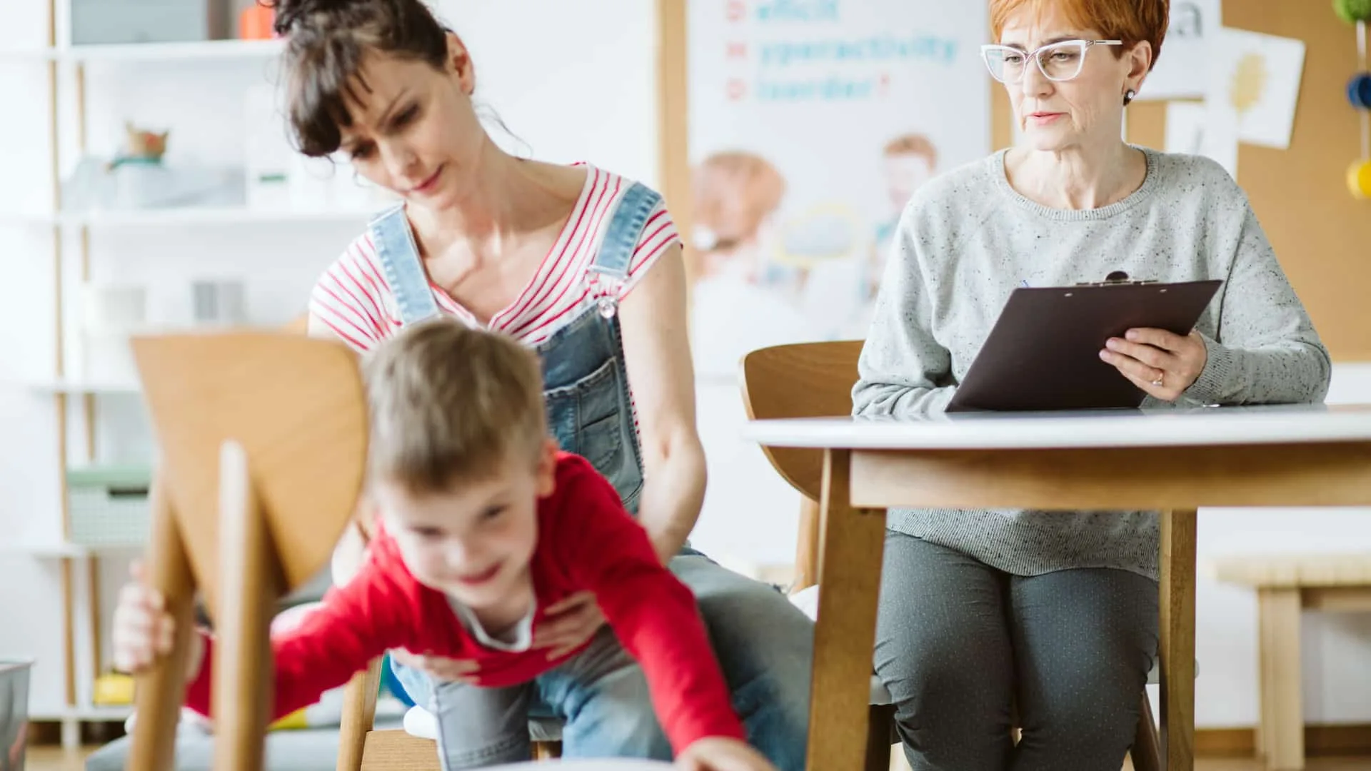 A specialist observes a child's activity levels and behavior