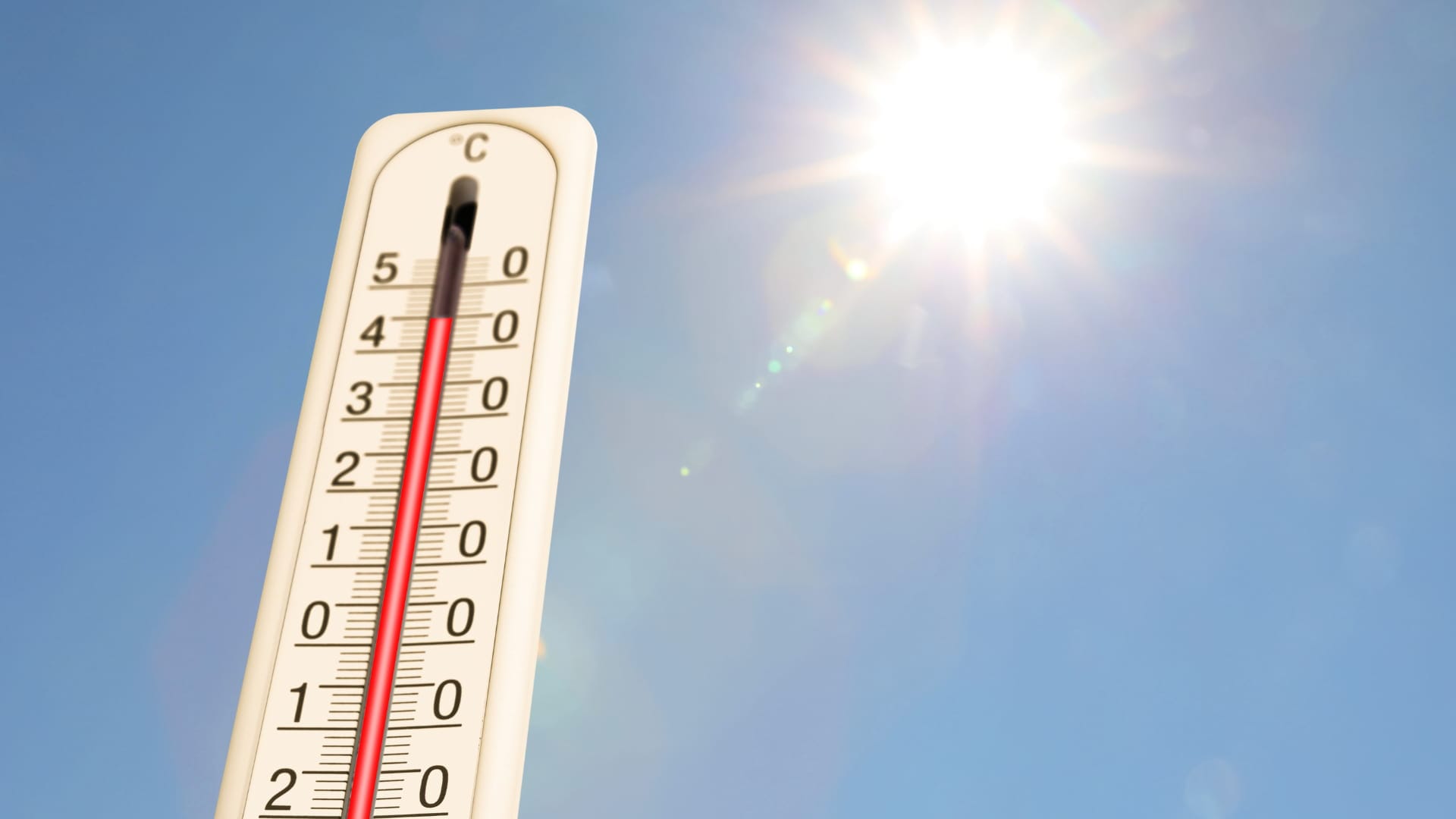 Thermometer measuring heat showing the impact of extreme heat on mind